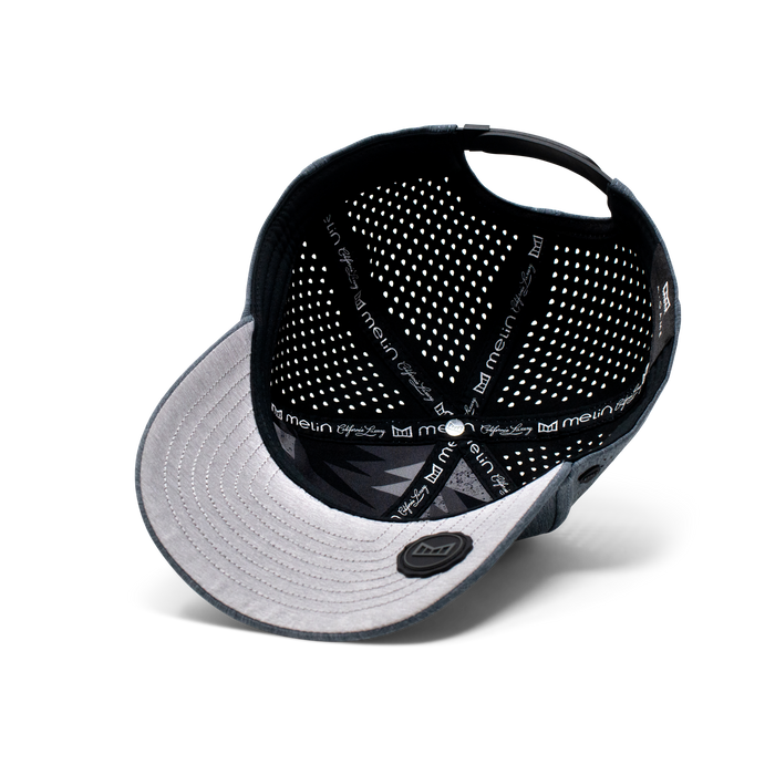 The inside view of the Melin Vintage Fit A-Game Hydro hat in dark grey