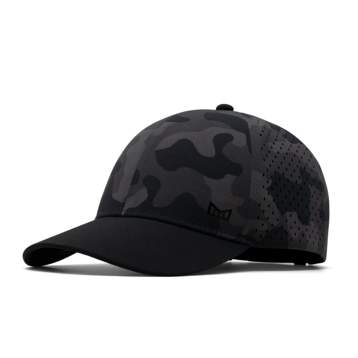 The front, angled view of the melin A-Game Hydrolite  Vintage Fit in  Black Camo