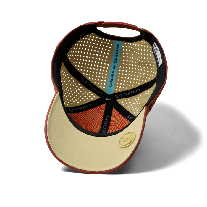 The inside view of the melin Vintage Fit A-Game Hydrolite hat in burnt brick