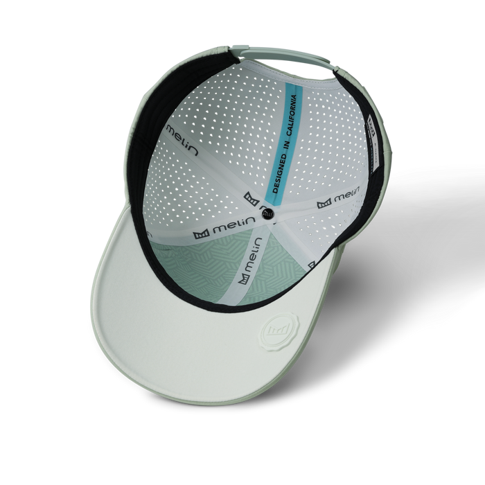 The inside view of the melin Vintage Fit A-Game Hydrolite hat in dusty mint