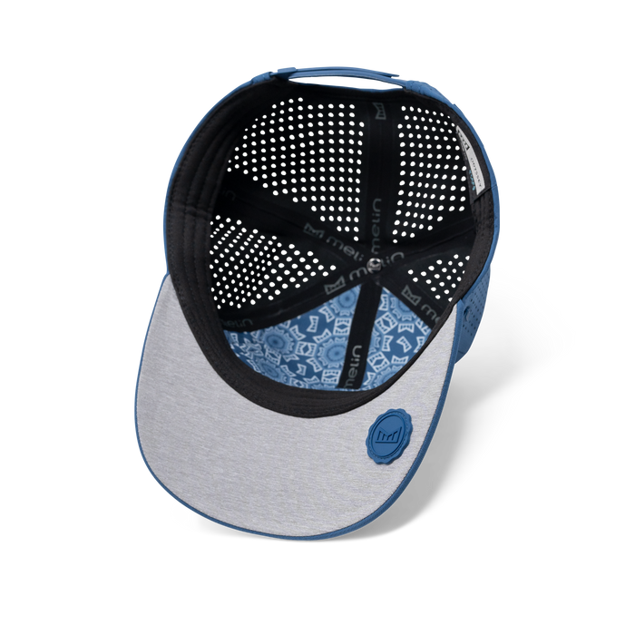 The inside view of melin's A-Game Hydrolite snapback hat in Steel Blue