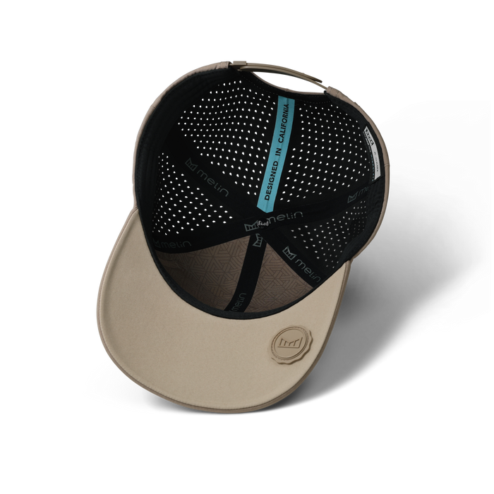 The inside view of the melin Vintage Fit A-Game Hydrolite hat in teak