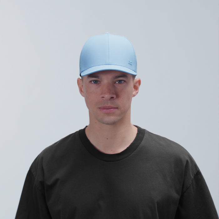 The model-image view of the melin Vintage Fit A-Game Hydro hat in Cashmere Blue