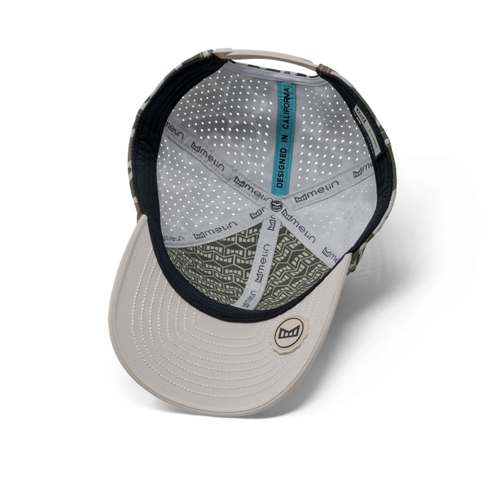 The inside view of the melin A-Game Icon Hydro  Vintage Fit in  Duck Camo