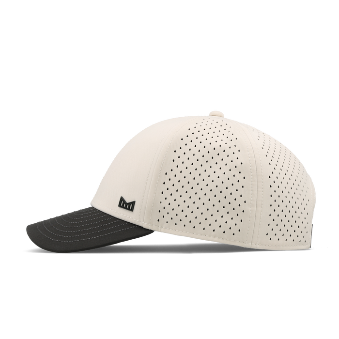 The side view of the melin A-Game Icon Hydro Vintage Fit in Moonbeam / Pirate Black