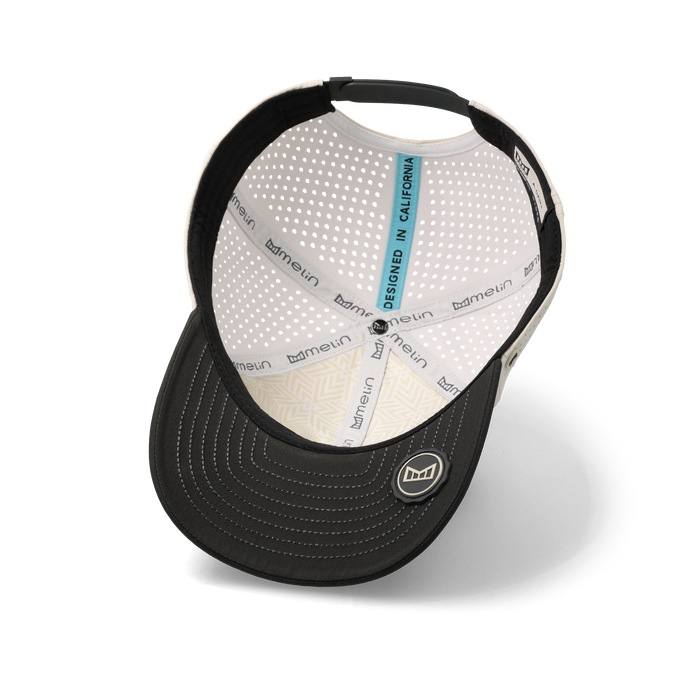 The inside view of the melin A-Game Icon Hydro Vintage Fit in Moonbeam / Pirate Black