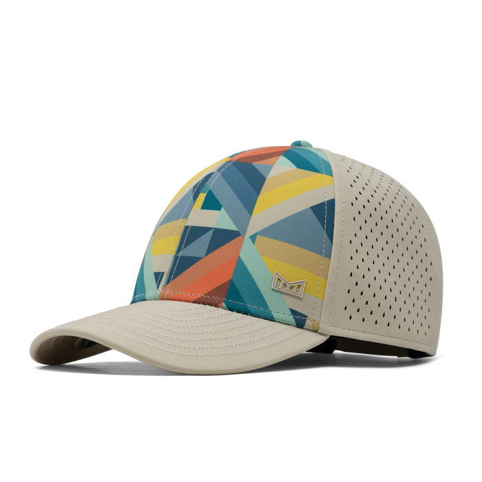 The front, angled view of the melin Vintage Fit A-Game Icon Hydro  in  Prismatic