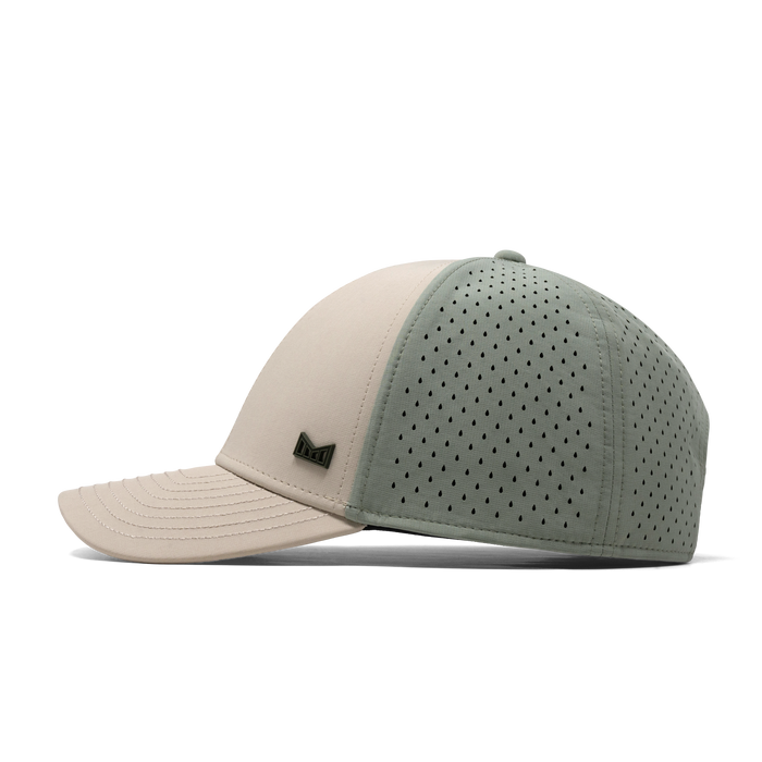The side view of the melin A-Game Icon Hydro Vintage Fit in Sandshell