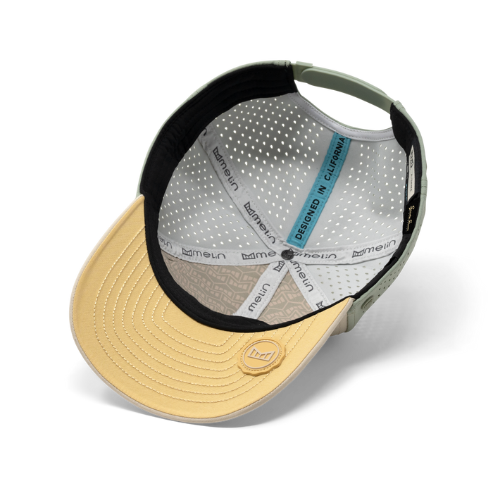 The inside view of the melin A-Game Icon Hydro Vintage Fit in Sandshell