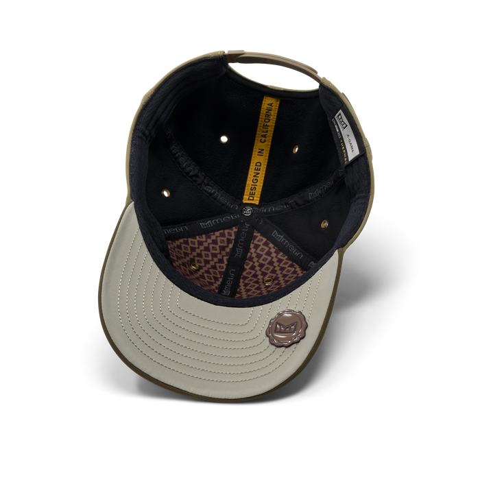 The inside view of the melin A-Game Infinite Thermal  Vintage Fit in  Dark Olive / Fig