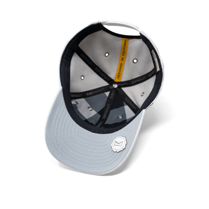 The inside view of the melin A-Game Infinite Thermal  Vintage Fit in Snow Camo