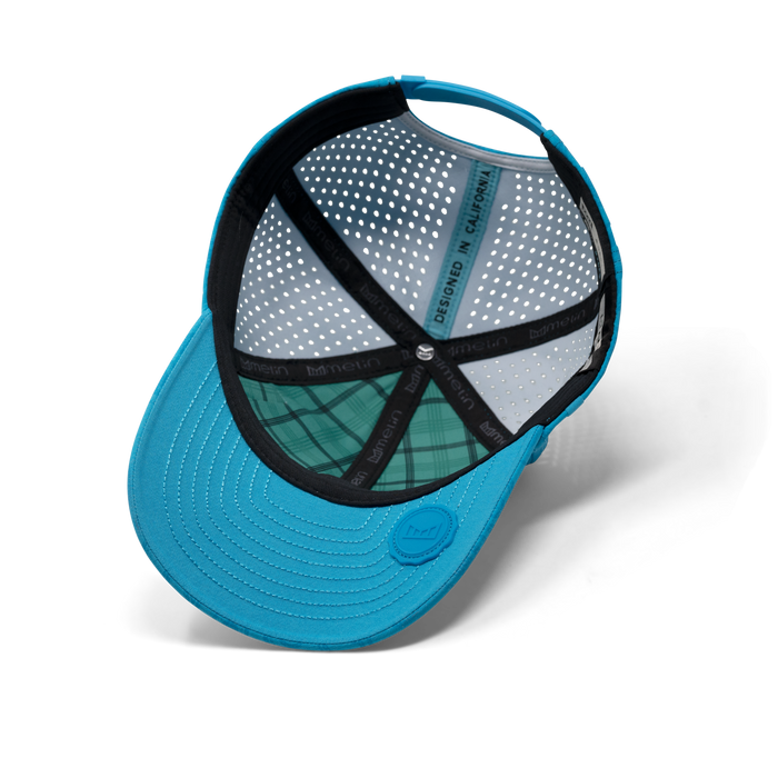 The inside view of the melin Vintage Fit A-Game Links Hydro  in  Electric Blue