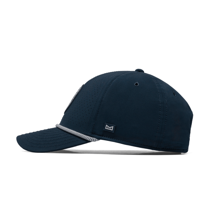 The side view of the melin A-Game Links Drive Hydro  Vintage Fit in  Navy / White