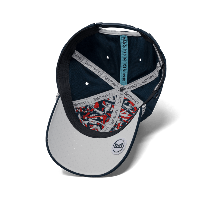 The inside view of the melin A-Game Links Drive Hydro  Vintage Fit in  Navy / White