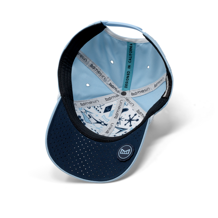 The inside view of the melin A-Game Links Hydro  Vintage Fit in Sky Blue / White