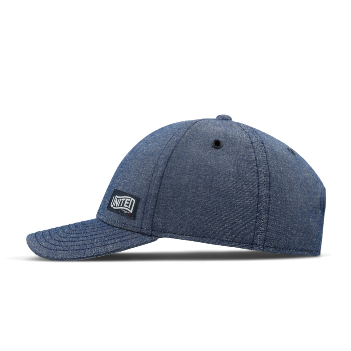 The side view of the melin A-Game Mill United  Vintage Fit in  Chambray