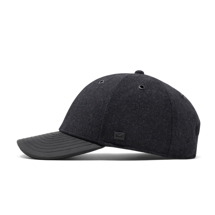 The side view of the melin A-Game Scout Thermal  Vintage Fit in  Black