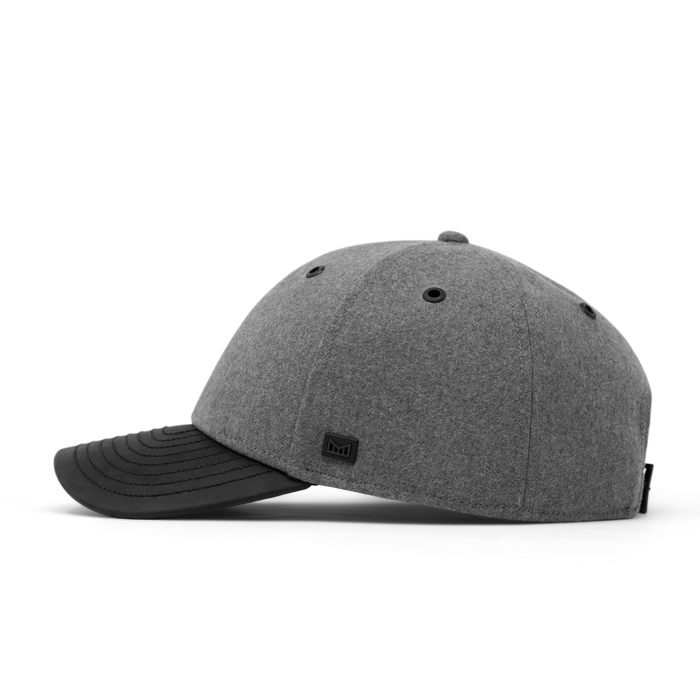 The side view of the melin A-Game Scout Thermal  Vintage Fit in Heather Grey / Black