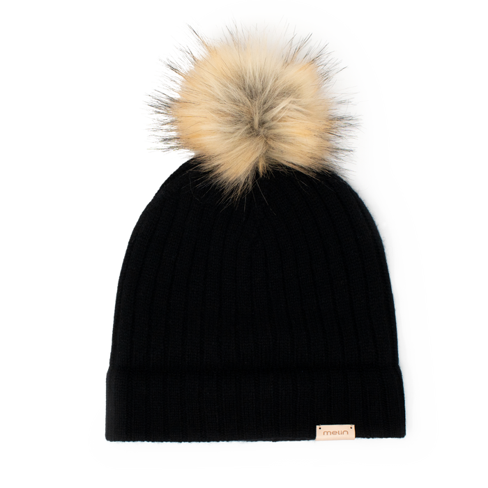 An alternate frontal view of the Melin All-Day Pom Beanie in black