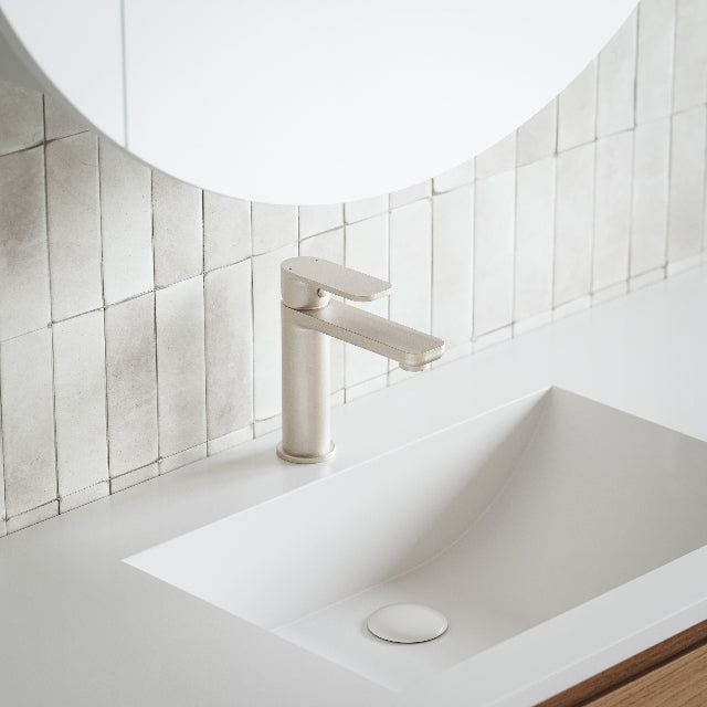 Caroma Luna Lead Free Basin Mixer Brushed Nickel in bathroom with subway feature tiles