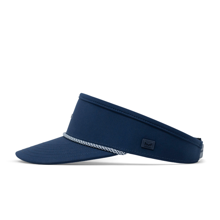 The side view of the melin Coast Hydro  Visor in  Navy