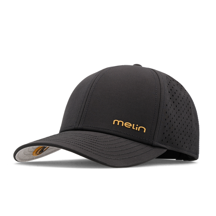 The front, angled view of the melin Compass Hydro  Vintage Fit in  Black / Gum