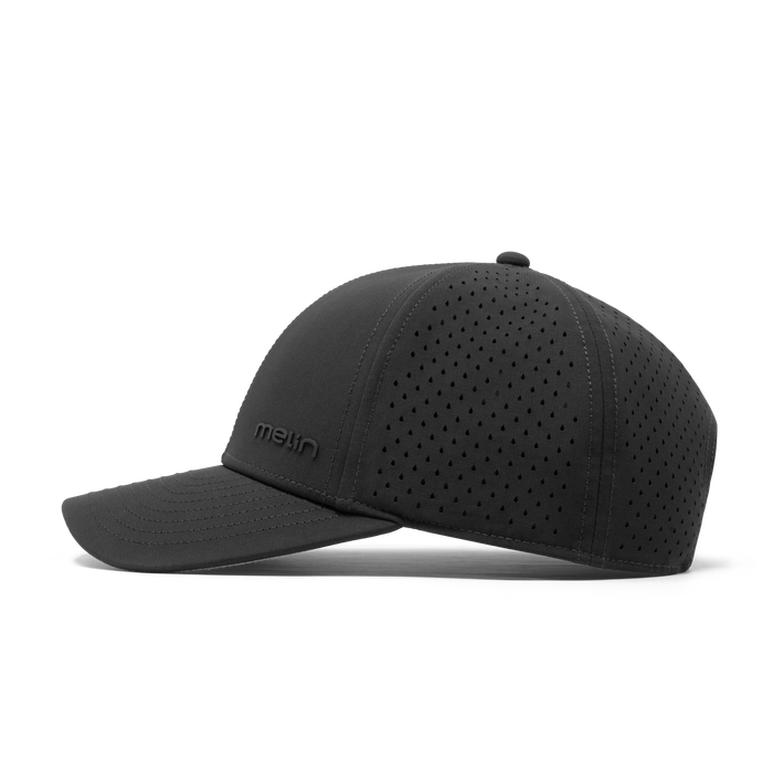 The side view of the melin Compass Hydro Vintage Fit in Black