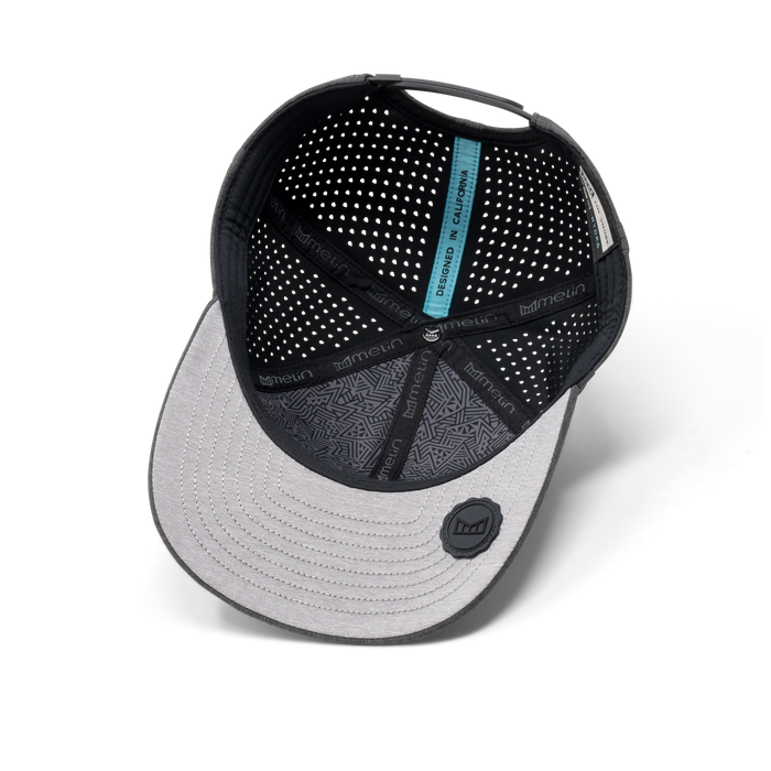 The back view of the melin Compass Hydro  Vintage Fit in  Heather Charcoal