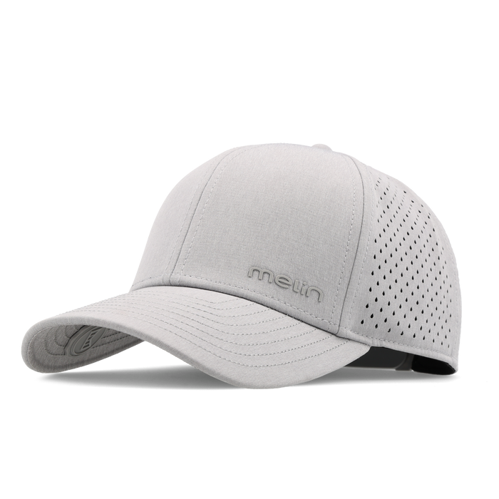 The front, angled view of the melin Compass Hydro  Vintage Fit in  Heather Grey