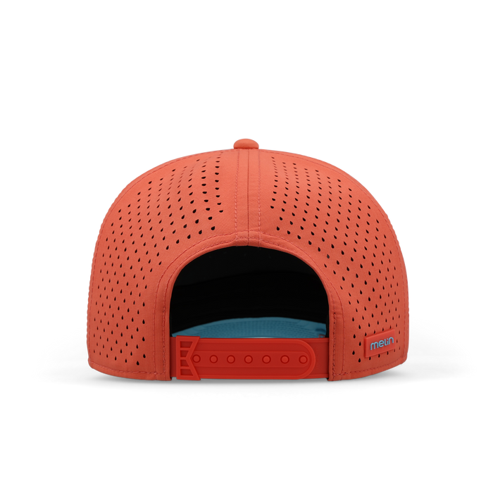 Hot coral baseball cap with perforated ventilation holes and adjustable back strap.
