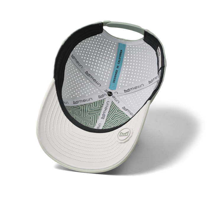 The inside view of the melin Compass Hydro Vintage Fit in Misty Trails