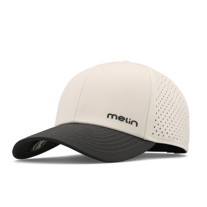 The front, angled view of the melin Compass Hydro Vintage Wide Fit in Moonbeam / Pirate Black