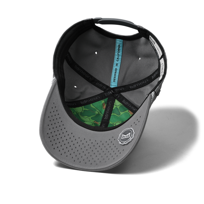 The inside view of the melin Vintage Fit Compass Links Hydro hat in grey