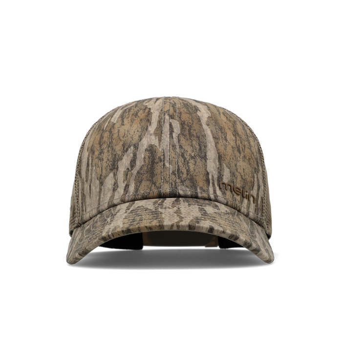 The front view of the melin Vintage Fit Compass Mossy Oak Hydro hat in Bottomland