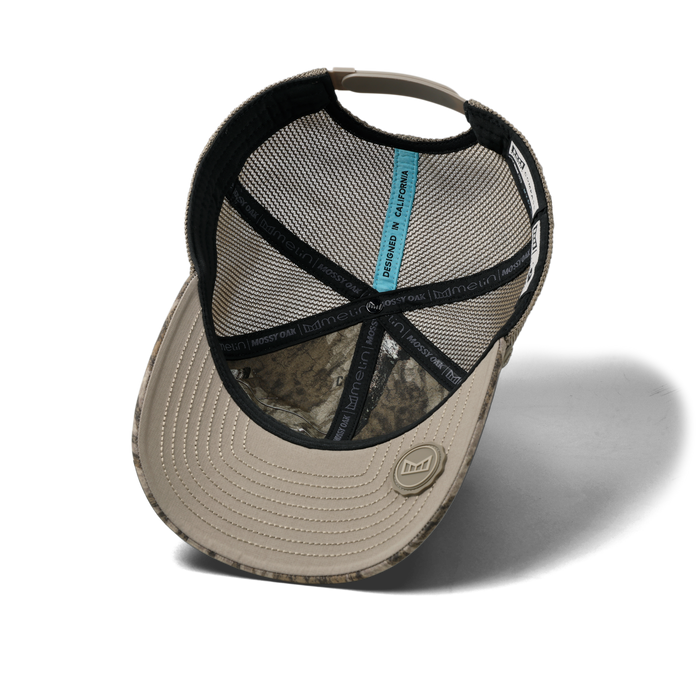 The inside view of the melin Vintage Fit Compass Mossy Oak Hydro hat in Bottomland
