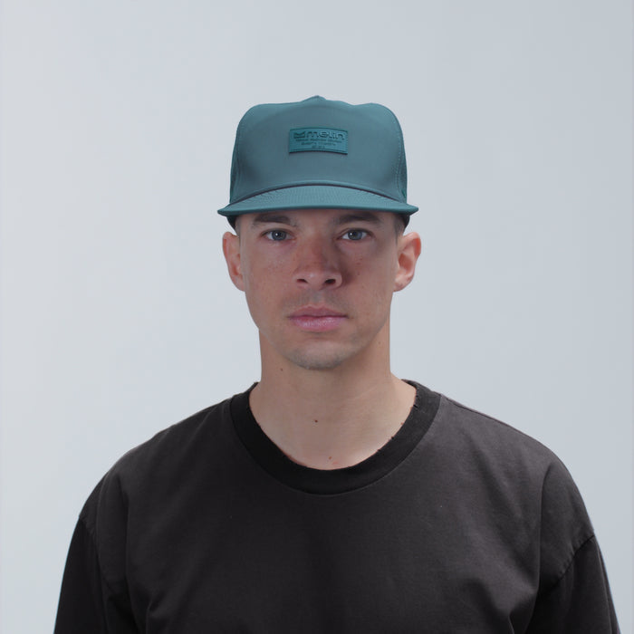 The model-image view of the melin Split Fit Coronado Hydro hat in Atlantic Deep