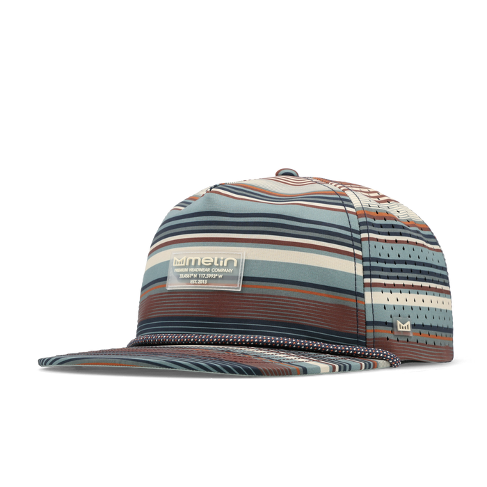 The angled view of the melin Split Crushed Fit Coronado Brick Hydro hat in Picante