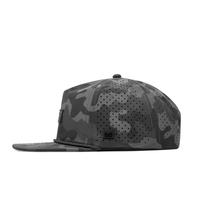 The side view of the melin Coronado Brick Hydro  Split Crushed Fit in  Black Camo