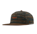 Brown and tan camouflage baseball cap with perforated mesh panels and front logo patch.