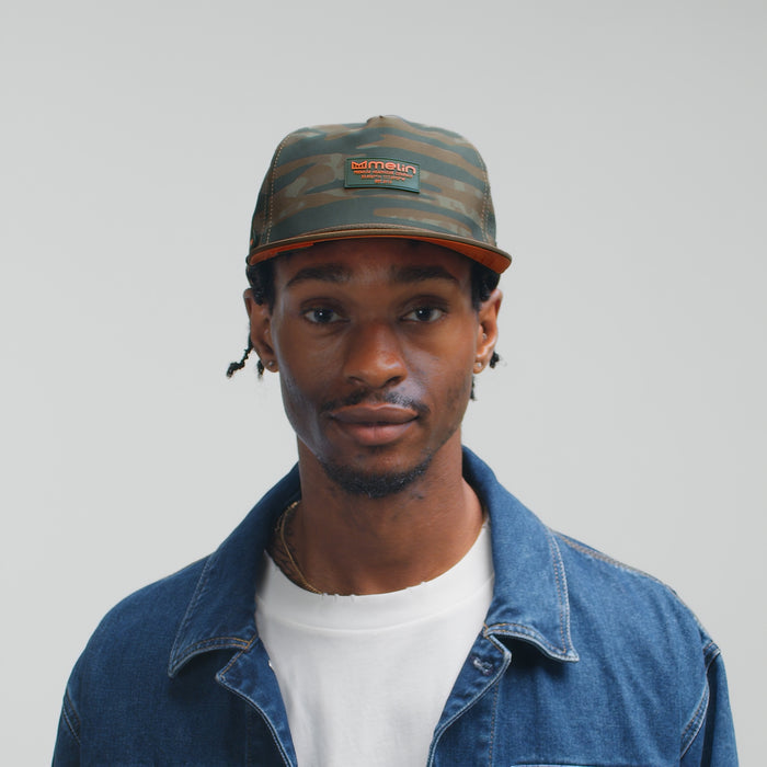 The model-image view of the melin Split Crushed Fit Coronado Hydro hat in Everglade Camo
