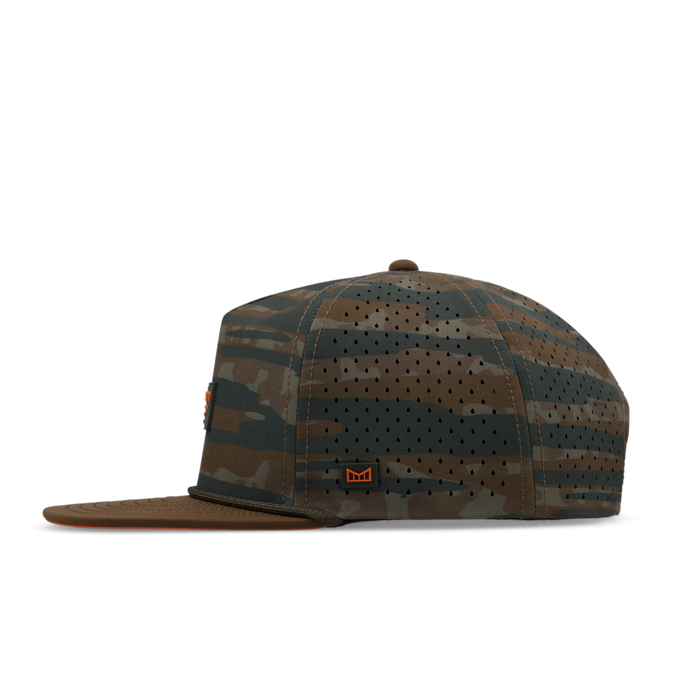 Coronado Brick Hydro cap in everglade camo with perforated panels, flat brim, and small red logo patch.