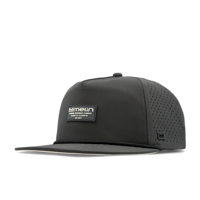 The angled view of the melin Split Crushed Fit Coronado Brick Hydro hat in faded black