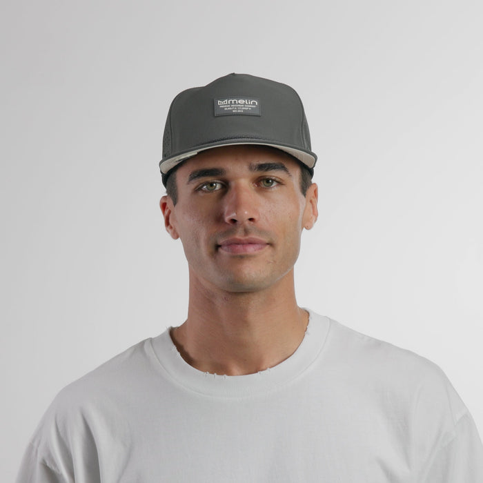 The model-image of the melin Split Crushed Fit Coronado Brick Hydro hat in faded black
