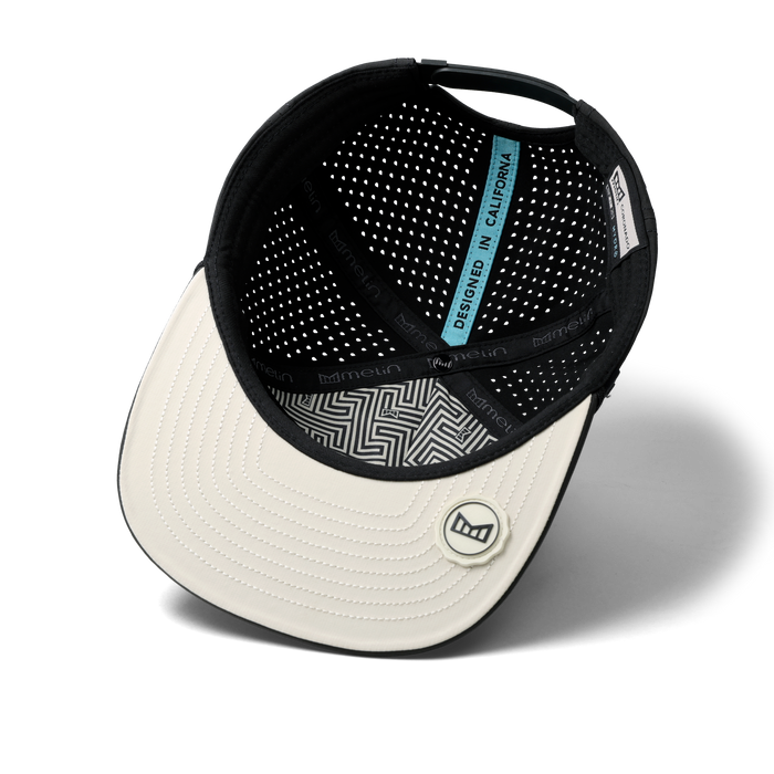 The inside view of the melin Split Crushed Fit Coronado Brick Hydro hat in faded black