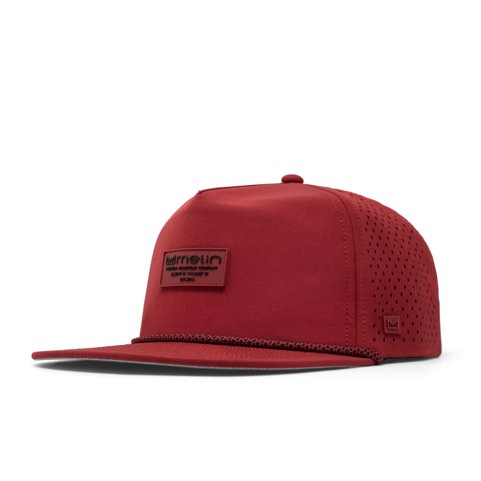 The front, angled view of the melin Coronado Brick Hydro  Split Crushed Fit in  Red
