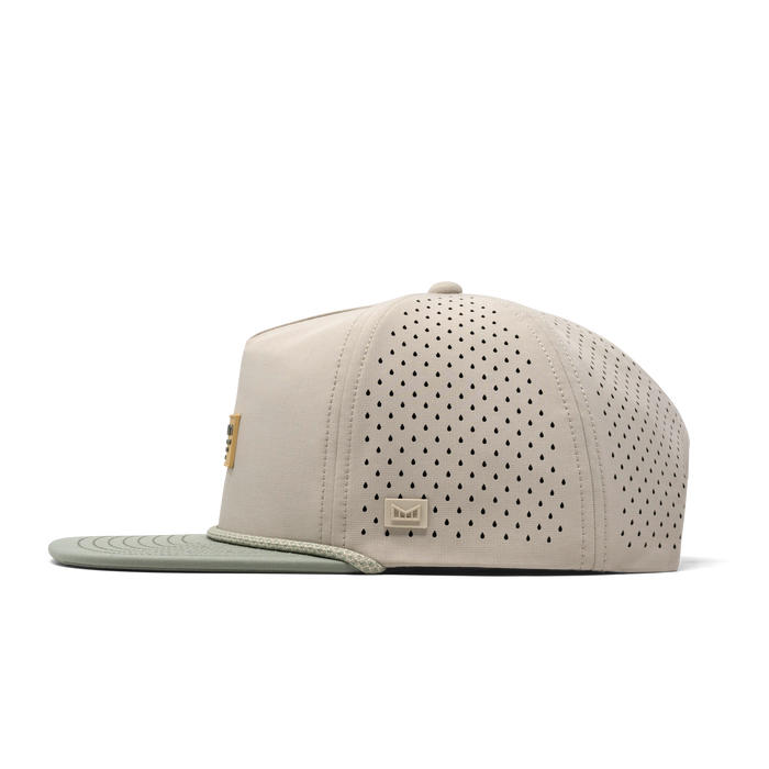 The side view of the melin Coronado Brick Hydro Split Crushed Fit in Sandshell