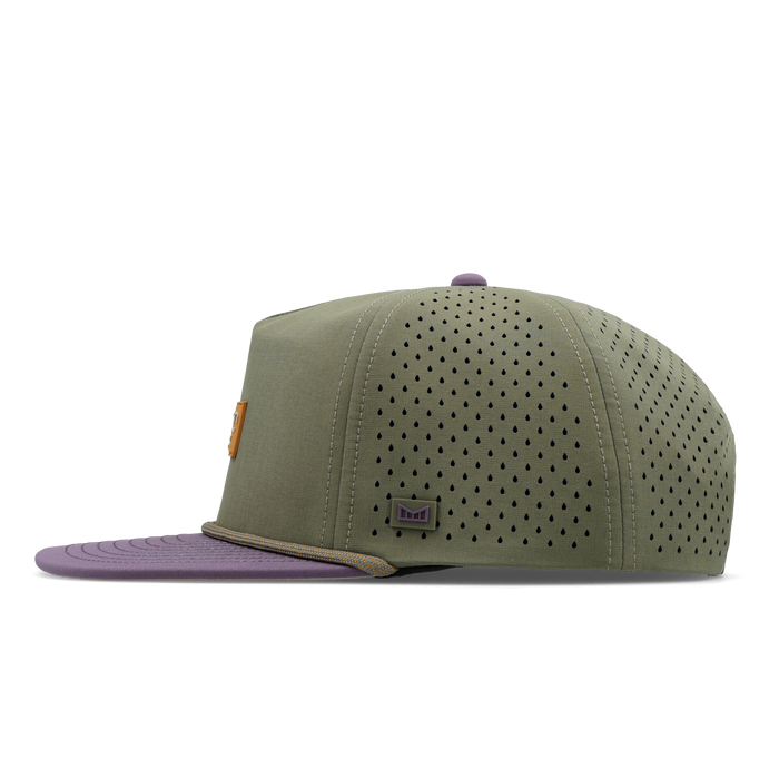 The side view of the melin Split Crushed Fit Coronado Brick Hydro hat in transit