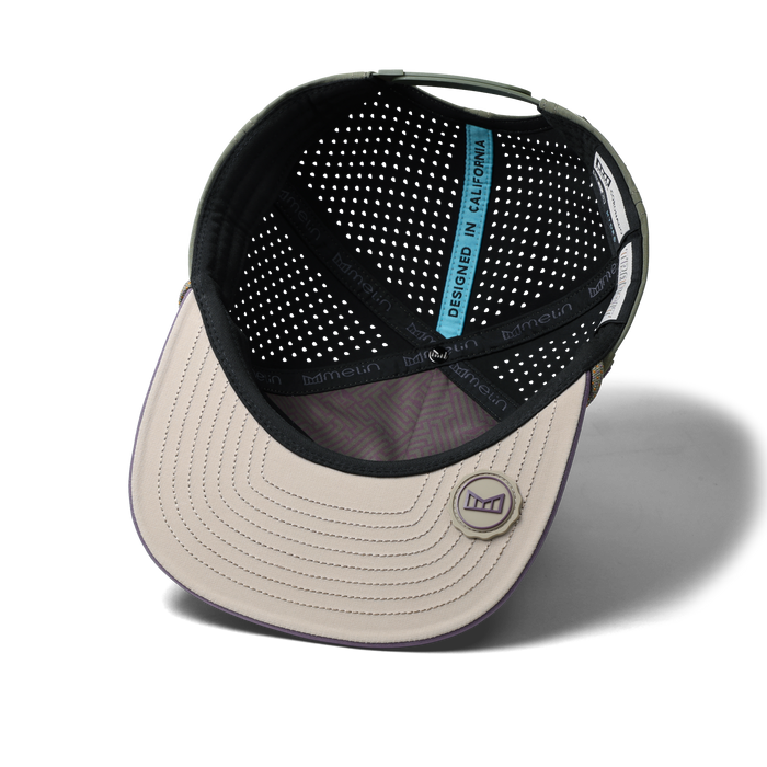 The inside view of the melin Split Crushed Fit Coronado Brick Hydro hat in transit
