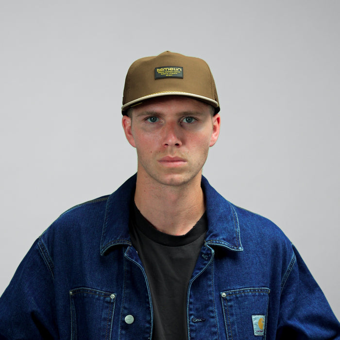 The model-image view of the melin Split Fit Crushed fit Coronado Hydro hat in Yellow Jacket