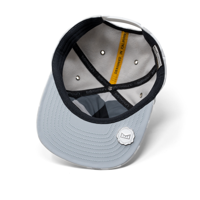 The inside view of the melin Coronado Brick Infinite Thermal  Split Crushed Fit in Snow Camo